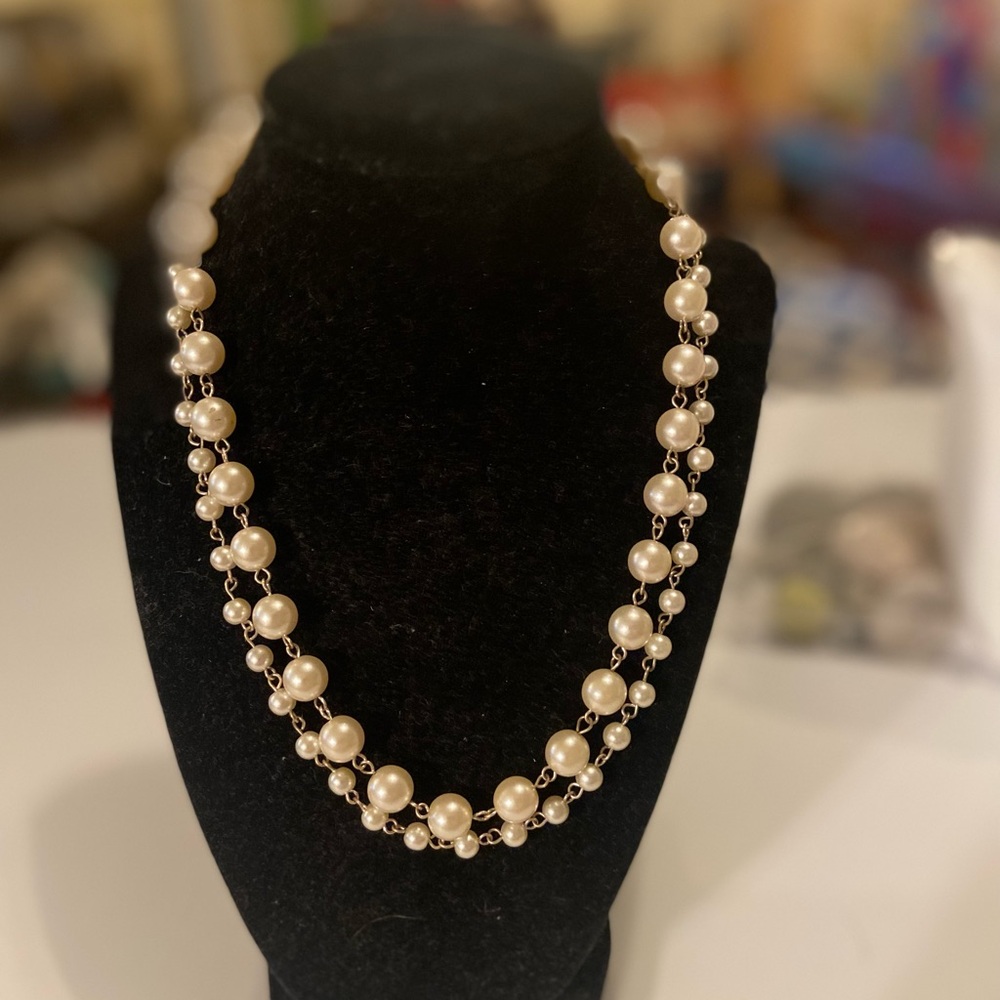 Woman’s faux pearl double strand necklace
